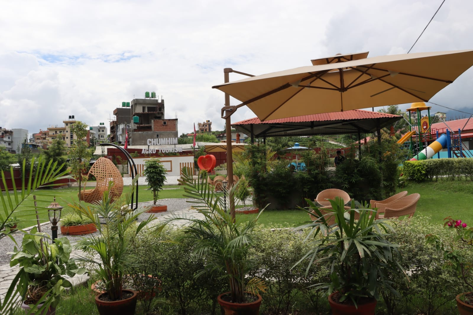 Guests walking through green Chumhim terraces